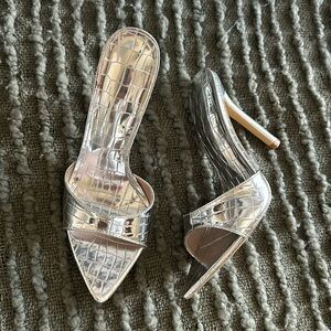 Open toed, silver pointed heels